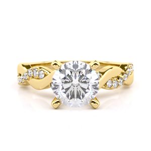 Calypso 18k yellow engagement ring with a central diamond and side stones