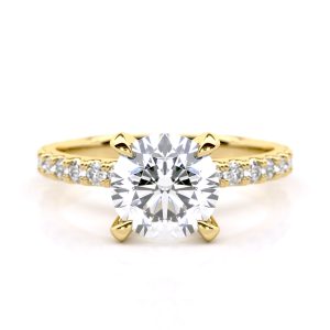 Tara Solitaire Engagement Ring with Round Cut Diamond and Accent Stones in 18k Yellow Gold